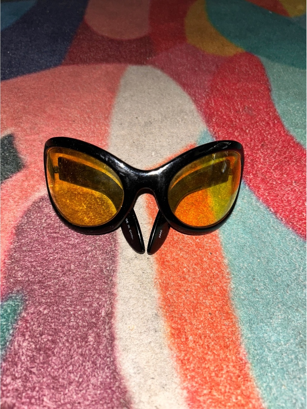 Black Frame Sunglasses with Orange Reflective Lenses